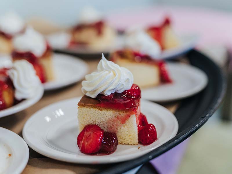 Strawberry shortcake with whipped cream and fresh strawberries